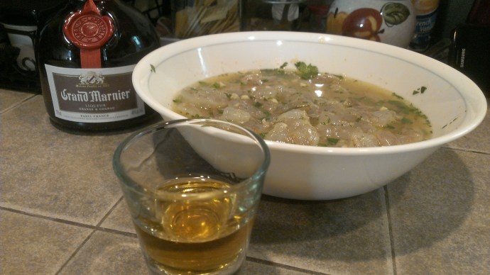 Grand Marnier two ways: in a shot glass, and as part of a marinade for grilled shrimp. 